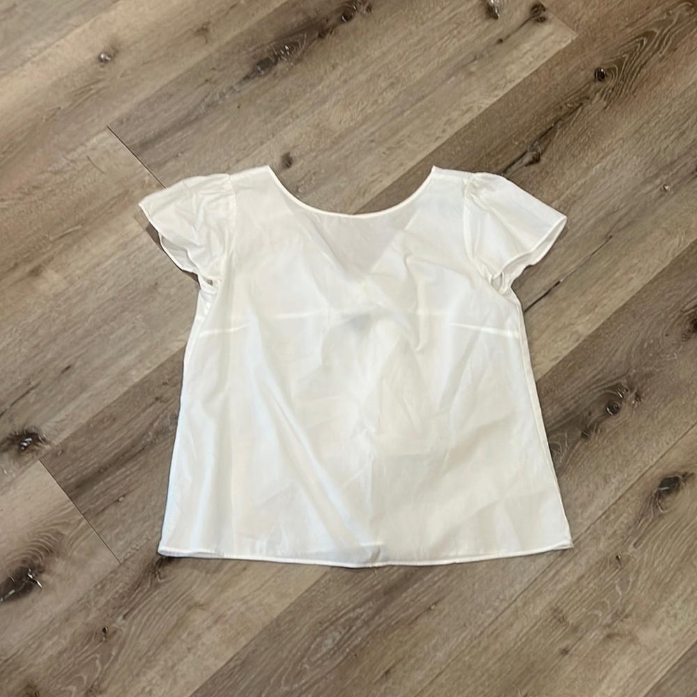 Cute white dress shirt with v- back and tie bow